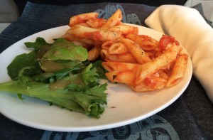 The same penne dish after being reheated and                                                                                                                   served to a first class passenger onboard a flight from Seattle to San Francisco.