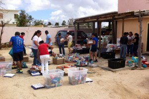 Alaska Airlines employees in Los Cabos divide supplies that were delivered. 